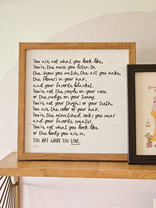  Boho Frame print hung on a neutral-toned wall, styled with soft textures and earthy boho elements.

