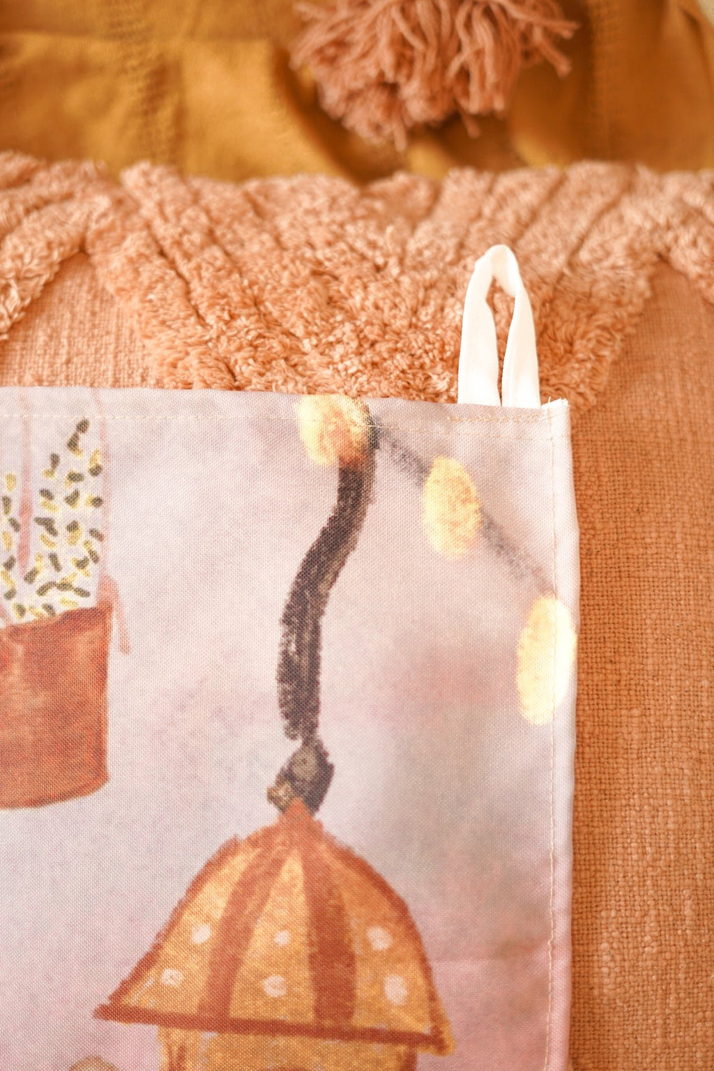 "Zoomed-in view of neatly folded tapestry showcasing clean stitching and premium quality cotton fabric texture.